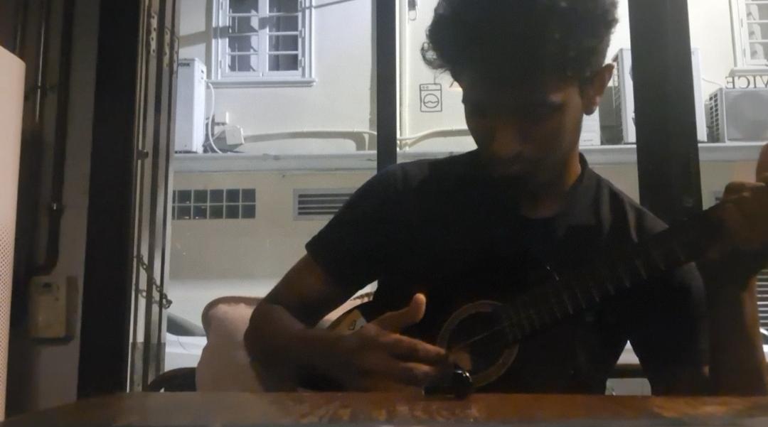 Playing ukulele